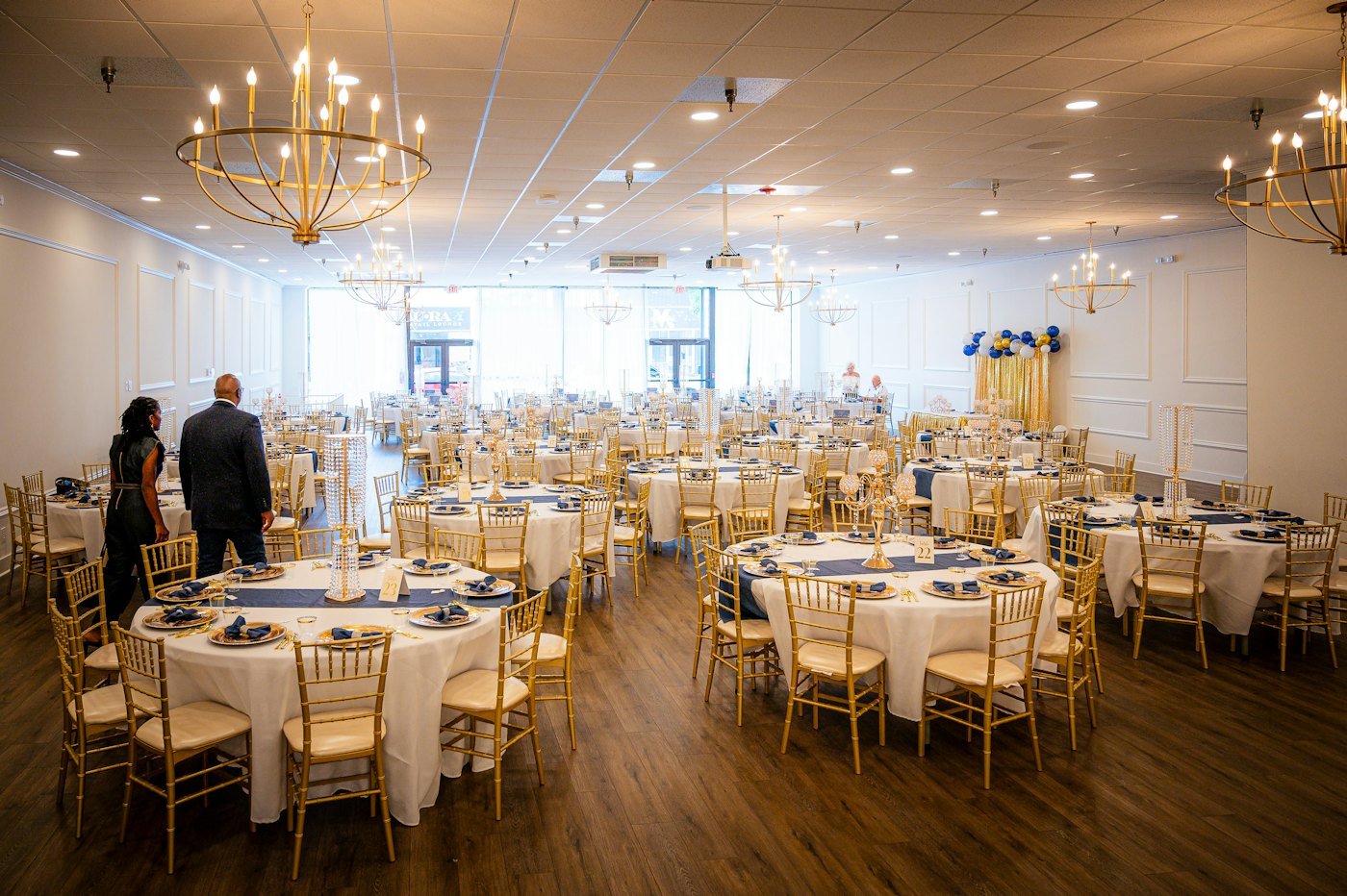 Elegant banquet hall set up with round tables for the event